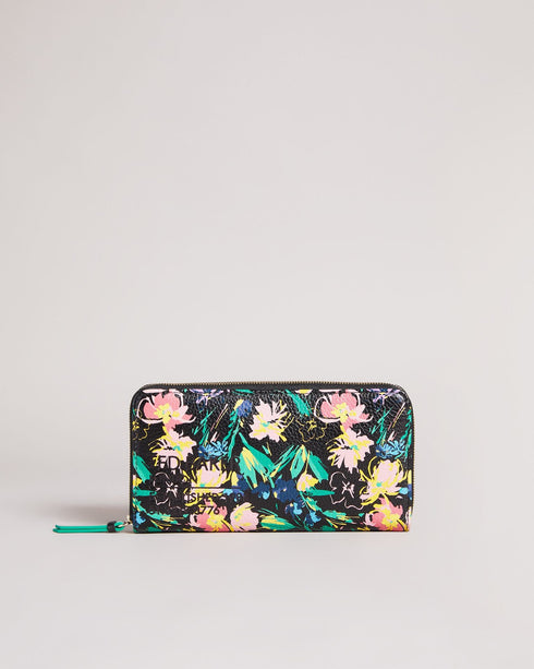 PARCIEA-Small goods-Let your outfit bloom with PARCIEA. This purse will bring the finishing touch to your ensemble with our Sketchy Magnolia print, luxurious glossy leather and a zip fastening to keep your valuables secure. By purchasing this product, you are supporting responsible leather manufacturing through the Leather Working Group. Ted Baker accessories collection Leather purse Popper fastening Card pockets Sketchy Magnolia print Zip closure Ted Baker branded Dimensions: 3cm x 10cm x 19cm- Ted Baker R